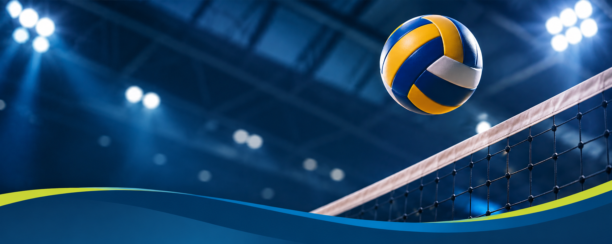 Volleyball and net in a floodlit indoor arena